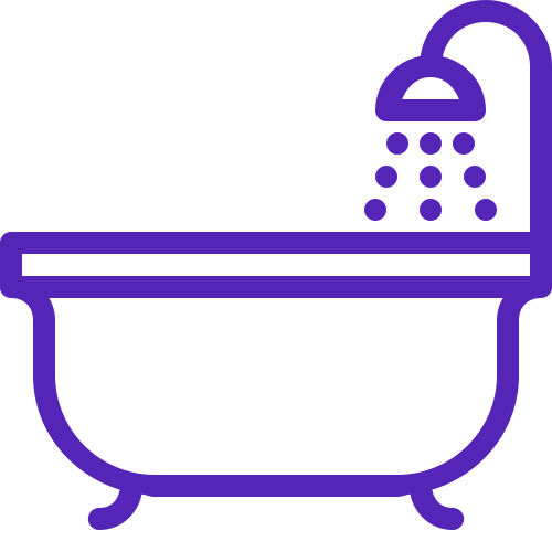 Bathtub with a showerhead spraying water